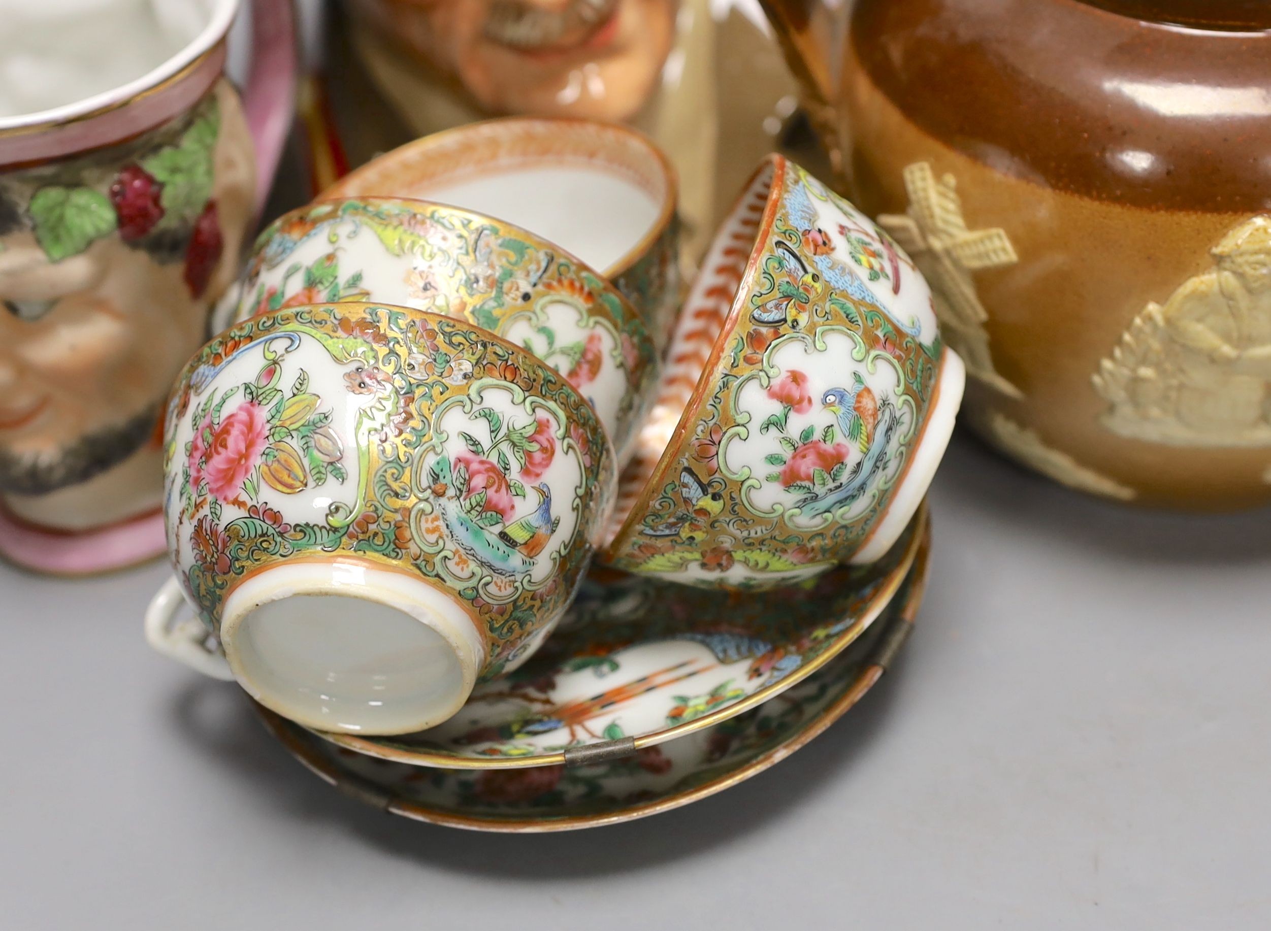 Three Royal Doulton jugs, Road Doulton figure the young master HN2872 and two other jugs and Chinese famille rose tea wares